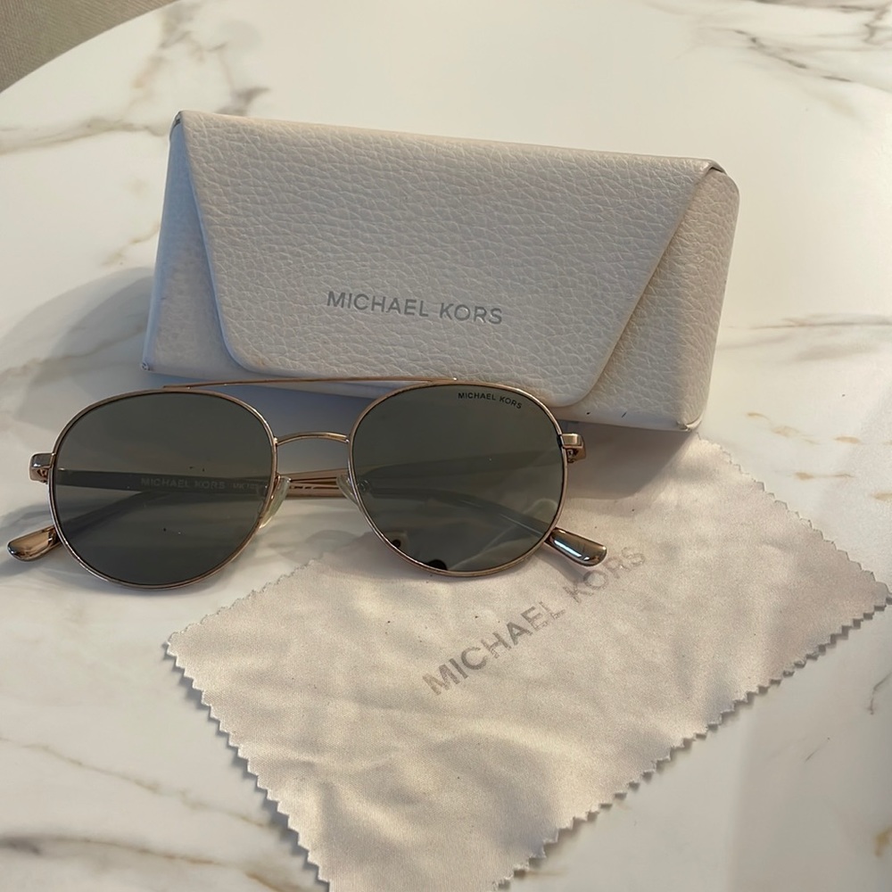 Michael Kors rose gold sunglasses and eye glass case.